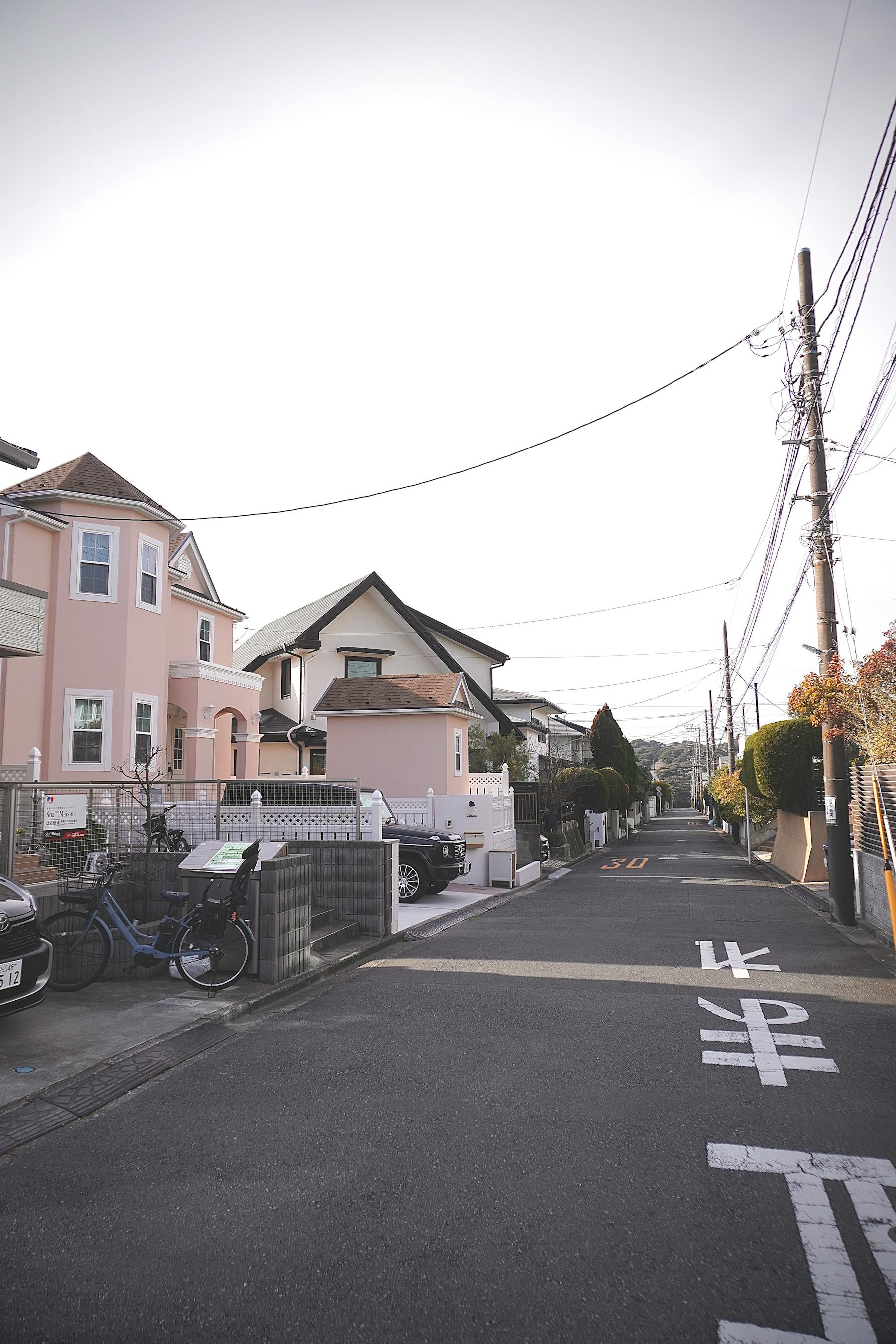 Quiet Japanese residential street in daylight